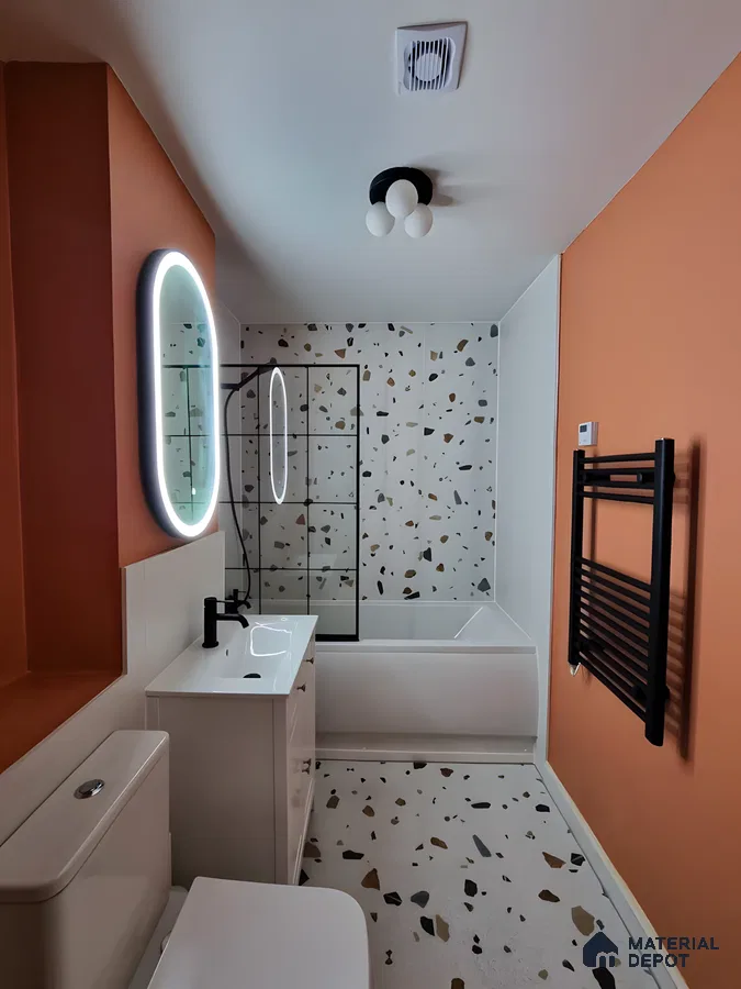 Stylish Restroom Interior with Patterned Shower Tiles and Sleek Fixtures | Material Depot