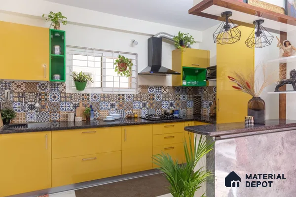 Modern 2 BHK apartment kitchen in Hyderabad with yellow theme and indoor plants, radiating a sunny and serene ambiance.
