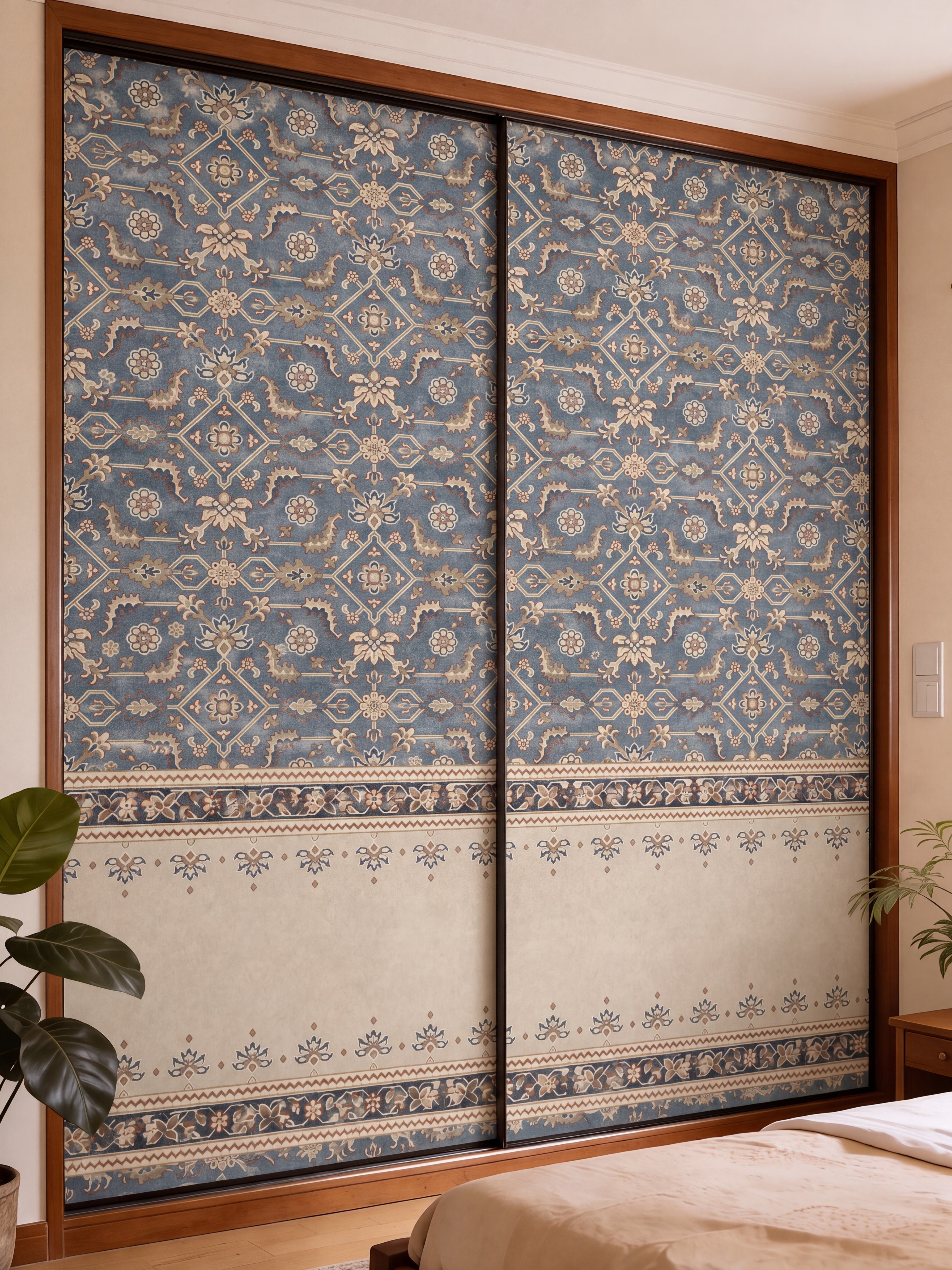 Traditional bedroom with blue patterned laminate sliding wardrobe and wooden frame