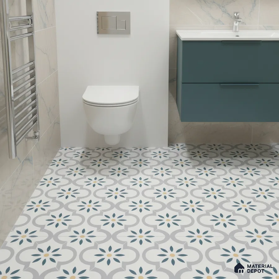 Modern bathroom with teal vanity and geometric patterned floor tiles