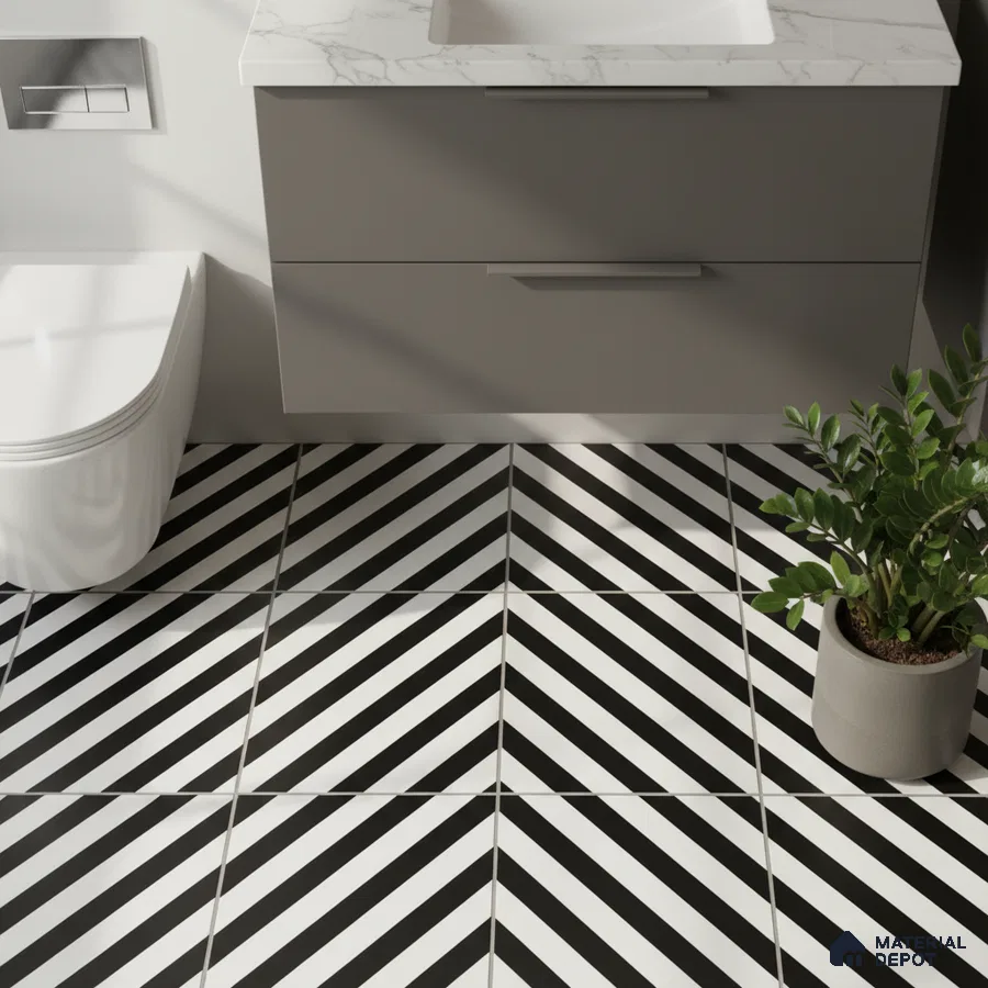 Modern bathroom with black-and-white chevron floor tiles and marble-look countertop