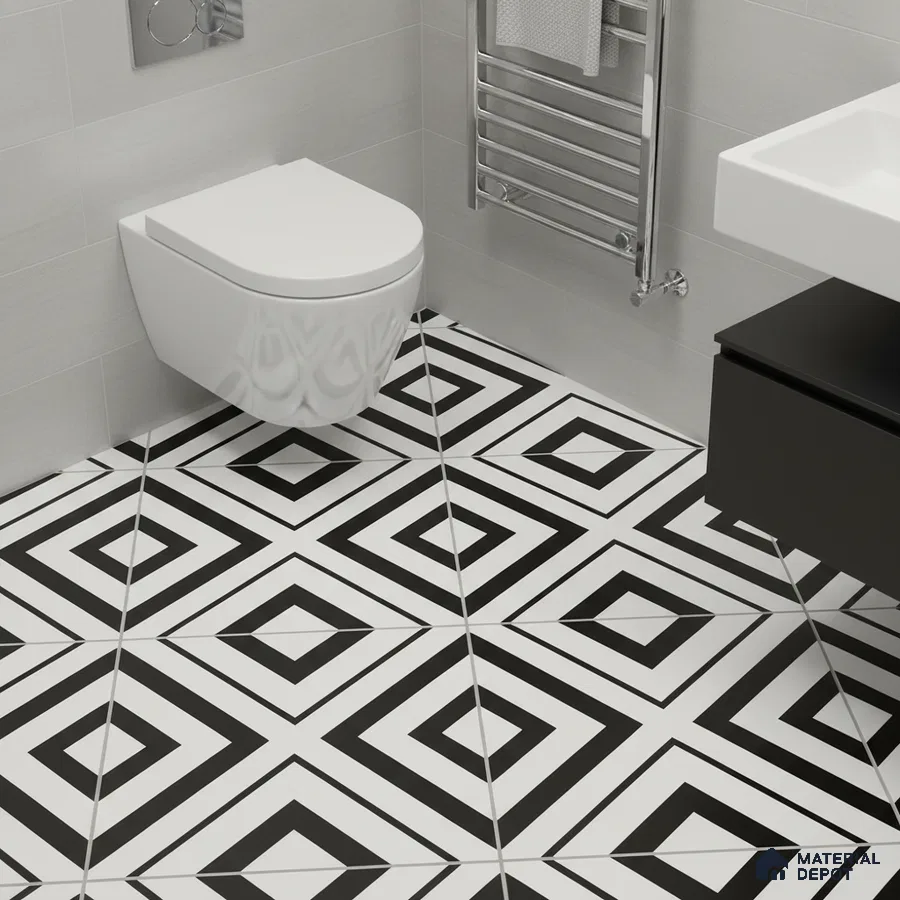 Modern bathroom with black-and-white geometric floor tiles and matte grey wall tiles
