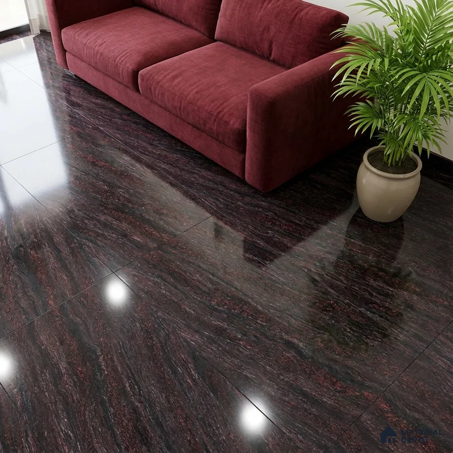 Modern living room with burgundy sofa and polished dark marble floor tiles