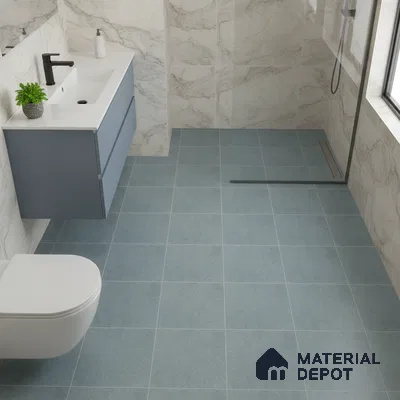 Modern bathroom with marble-look wall tiles, blue floor tiles, and matte blue floating vanity