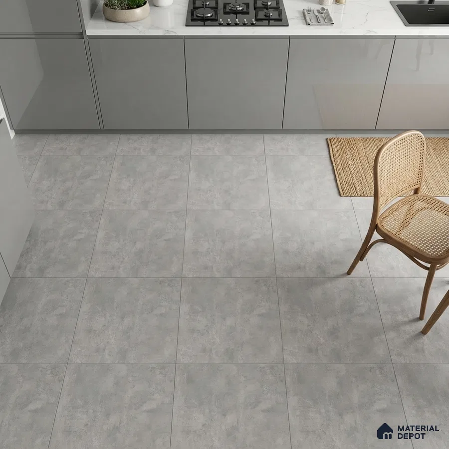 Modern kitchen with grey high gloss laminate cabinets and light grey stone-look floor tiles