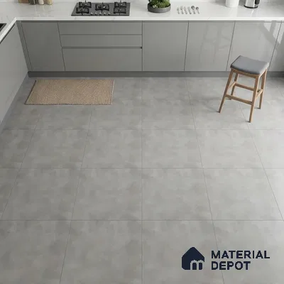 Modern kitchen with grey matte laminate cabinets, white marble countertop, and light grey stone-look floor tiles