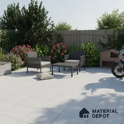 Modern outdoor patio with light grey matte floor tiles and wicker furniture