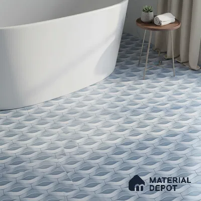 Modern bathroom with blue geometric patterned floor tiles and freestanding tub