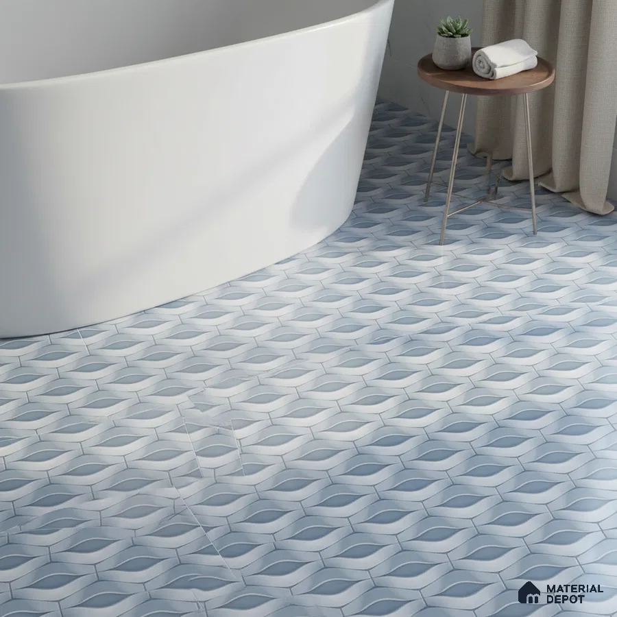 Modern bathroom with blue geometric patterned floor tiles and freestanding tub