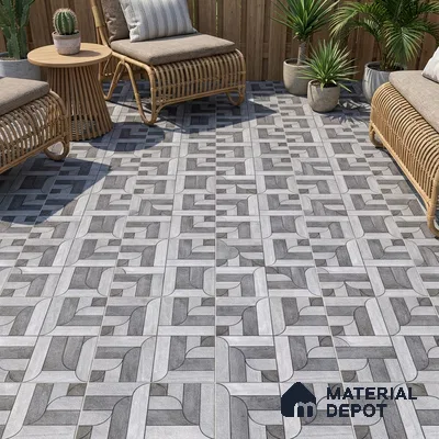 Modern outdoor space with geometric grey floor tiles and rattan furniture