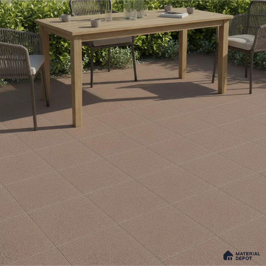 Minimalist outdoor space with matte terracotta floor tiles and natural wood dining table