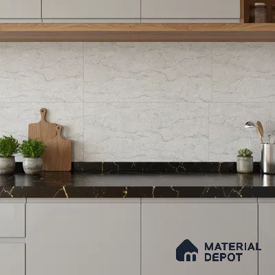 Modern kitchen with white marble-look backsplash tile, black marble countertop, and light grey laminate cabinets