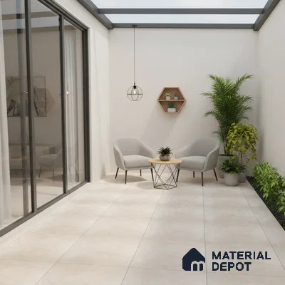 Minimalist balcony with beige floor tiles, light grey fabric chairs, and indoor plants