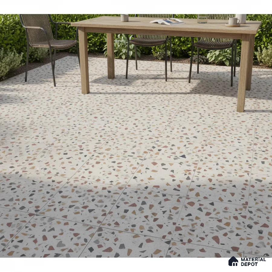 Modern outdoor space with multicolor terrazzo floor tiles and natural wood dining table