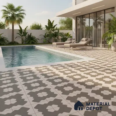 Modern outdoor poolside with geometric patterned floor tiles and tropical landscaping
