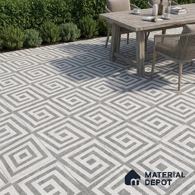 Modern outdoor space with geometric grey and white patterned floor tiles