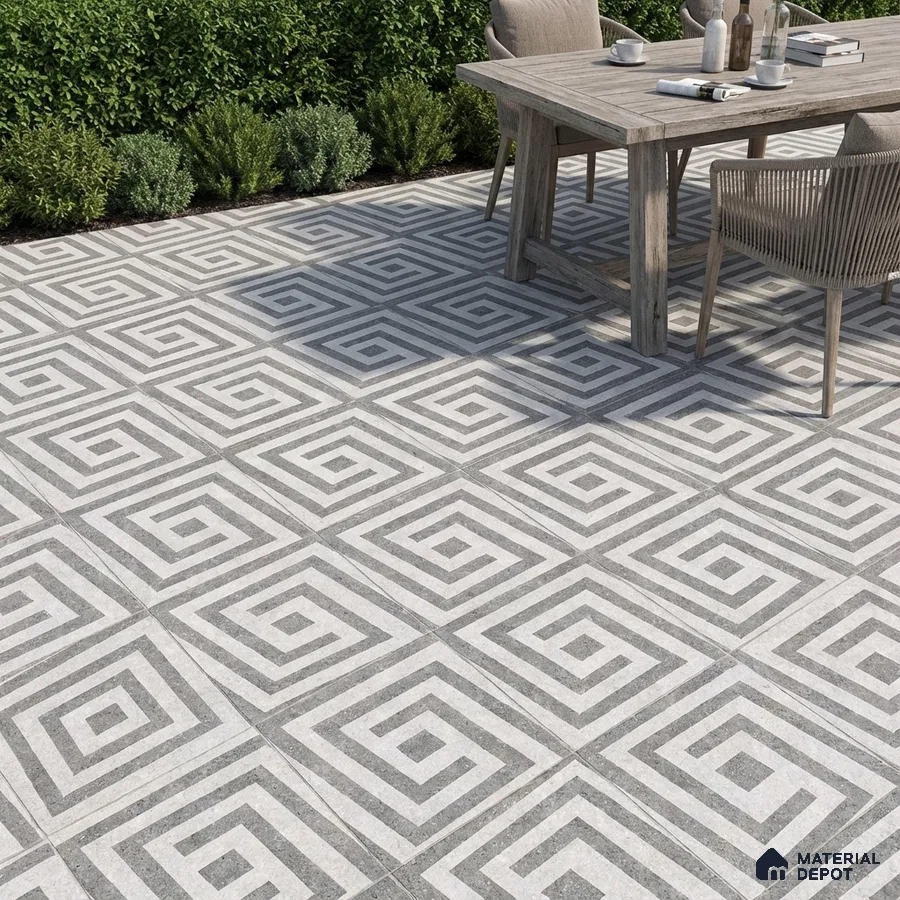 Modern outdoor space with geometric grey and white patterned floor tiles