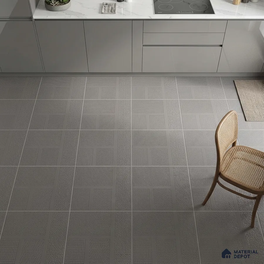 Modern kitchen with grey high gloss laminate cabinets, white marble countertop, and textured grey geometric floor tiles