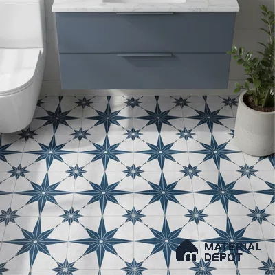 Modern bathroom with blue geometric patterned floor tiles and matte blue vanity