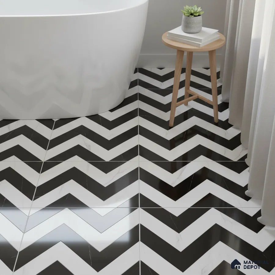 Modern bathroom with black-and-white chevron floor tiles and freestanding tub