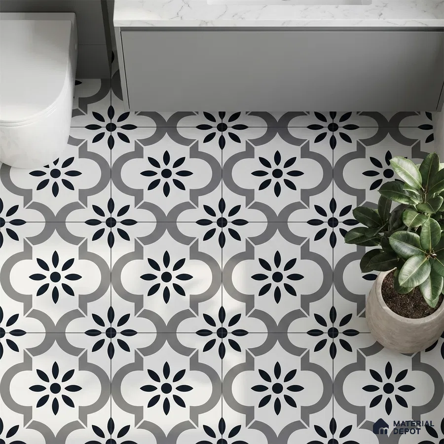 Modern bathroom with black-and-white geometric patterned floor tiles and marble countertop vanity