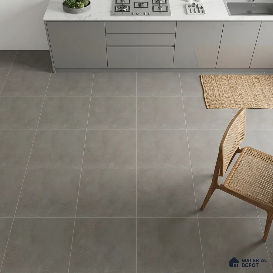 Minimalist kitchen with grey matte laminate cabinets and large format grey stone floor tiles