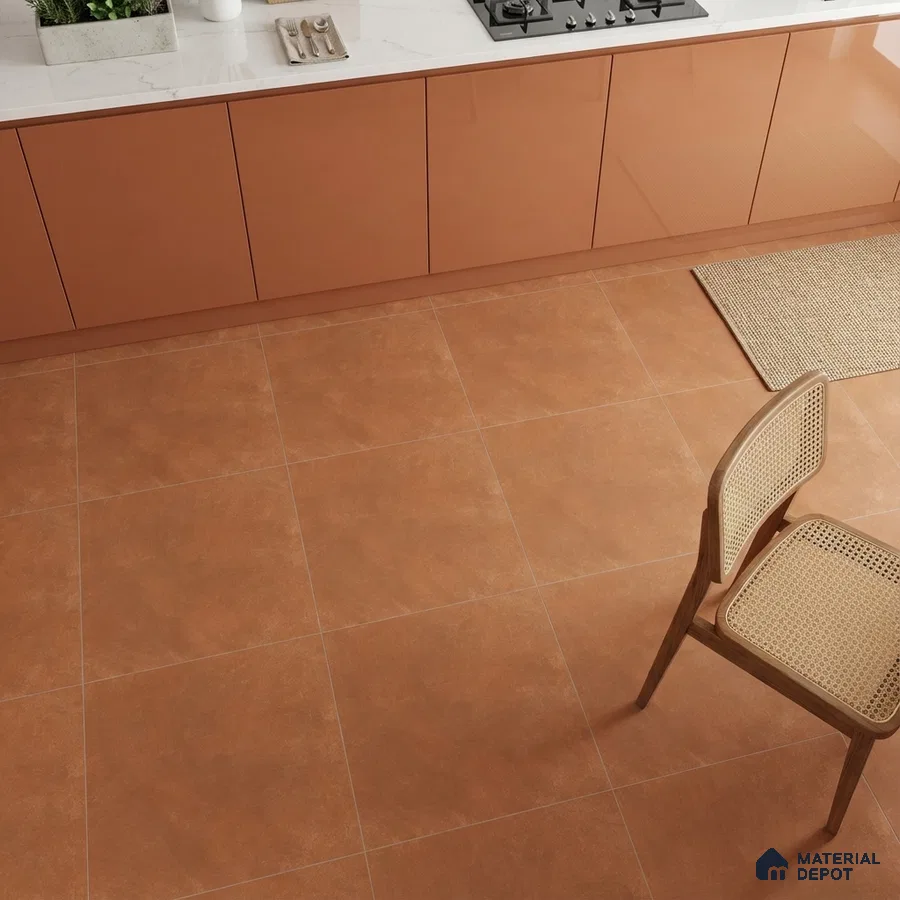 Modern kitchen with terracotta laminate cabinets and white marble countertop