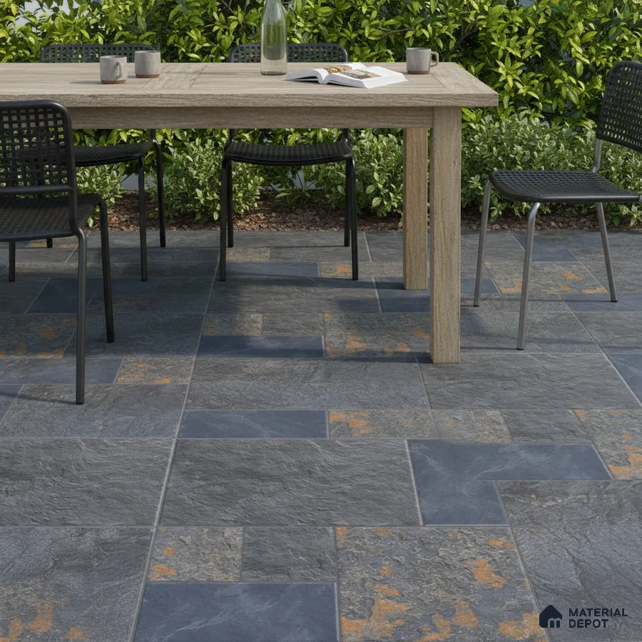 Modern outdoor space with slate-look stone tiles and natural wood dining table