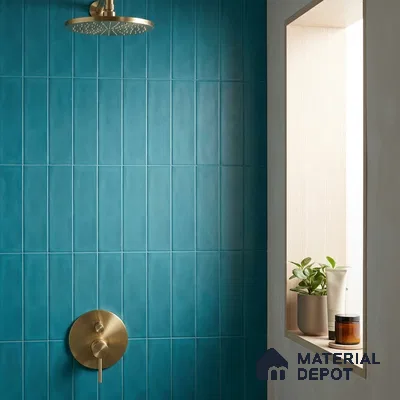 Modern Bathroom with Teal Blue Subway Tile and Brass Fixtures