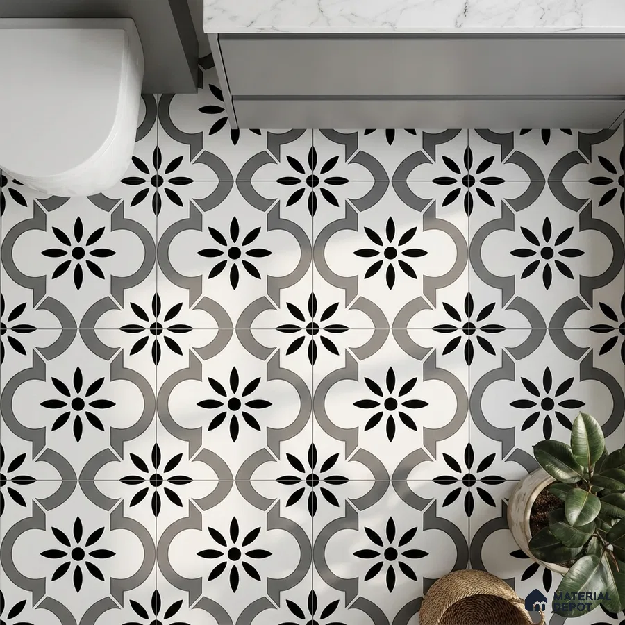 Modern bathroom with black-and-white floral patterned floor tiles and marble countertop