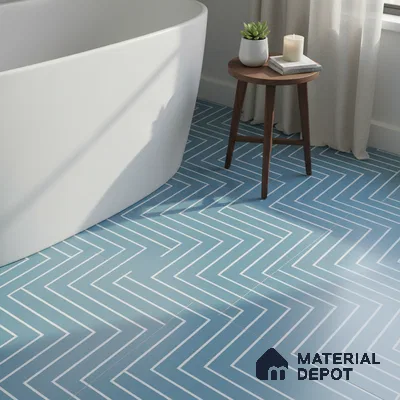 Modern bathroom with blue geometric zigzag floor tiles and freestanding tub