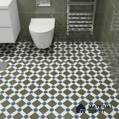 Modern bathroom with olive green marble wall tiles and blue geometric patterned floor tiles