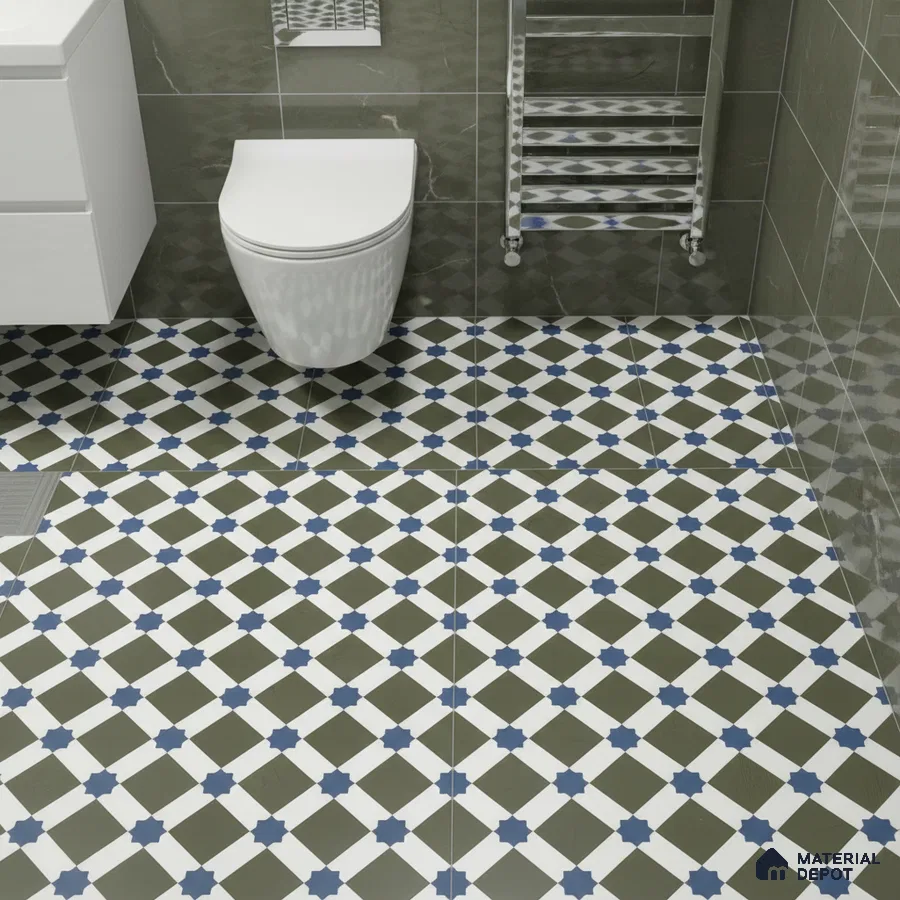 Modern bathroom with olive green marble wall tiles and blue geometric patterned floor tiles