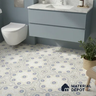 Modern bathroom with blue vanity, white marble countertop, and blue floral patterned floor tiles