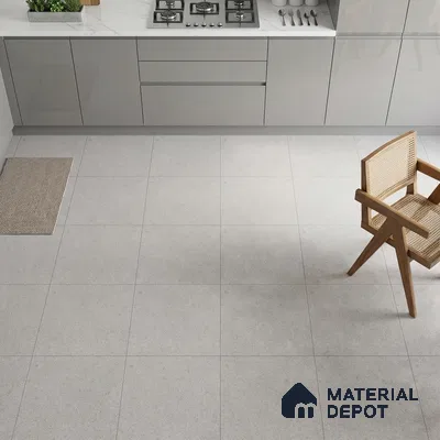 Modern kitchen with grey high gloss laminate cabinets, white marble countertop, and light grey matte floor tiles