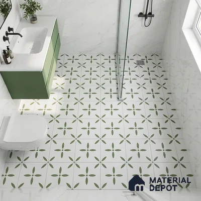 Modern bathroom with sage green vanity, white marble wall tiles, and green floral patterned floor tiles