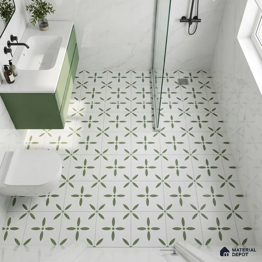 Modern bathroom with sage green vanity, white marble wall tiles, and green floral patterned floor tiles