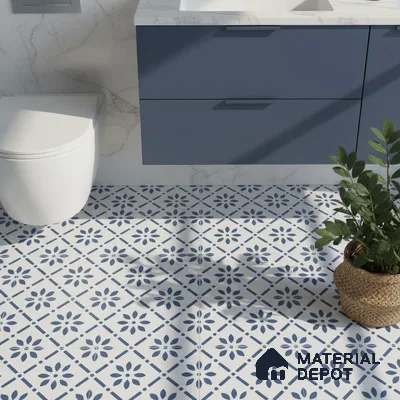 Modern bathroom with blue vanity, marble wall, and blue-and-white floral patterned floor tiles