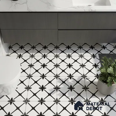 Modern bathroom with black-and-white geometric floor tiles and marble countertop