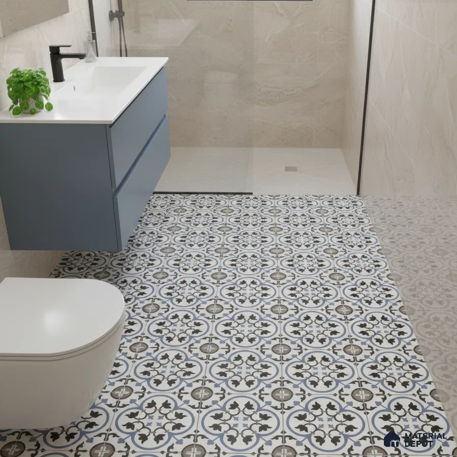 Modern bathroom with blue vanity, white quartz countertop, and blue-black patterned moroccan floor tiles