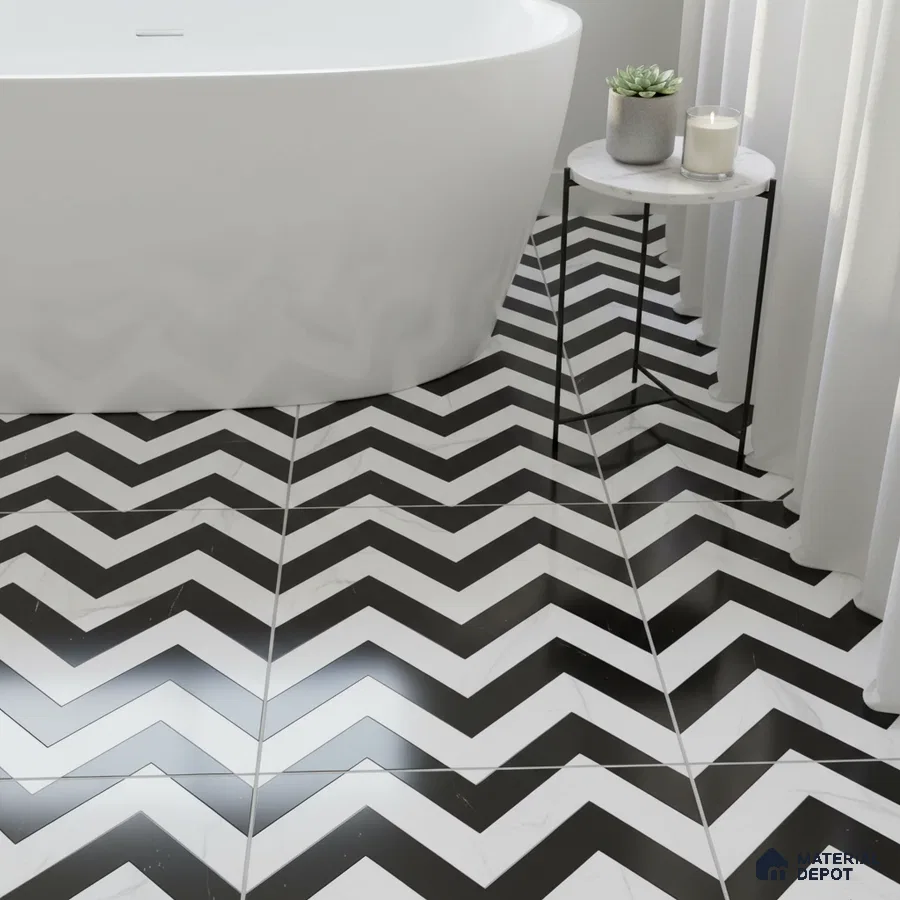 Modern bathroom with black-and-white chevron patterned floor tiles and freestanding tub