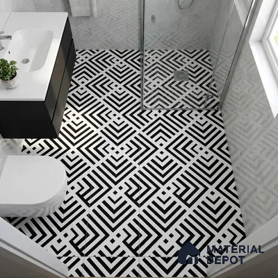 Modern bathroom with black-and-white geometric patterned floor tiles and white marble wall tiles