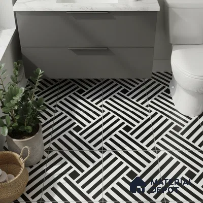 Modern bathroom with geometric black-and-white floor tiles and grey vanity with marble countertop