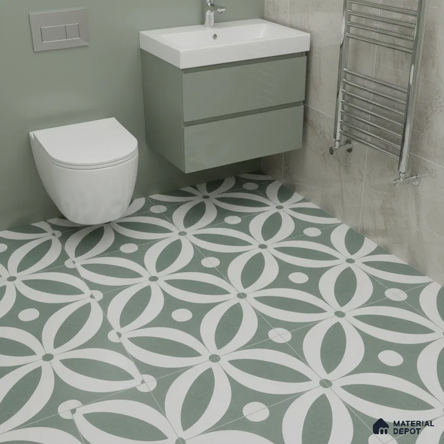 Modern bathroom with sage green vanity and geometric patterned floor tiles