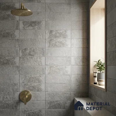 Industrial Bathroom with Grey Stone-Look Subway Tile and Brass Fixtures