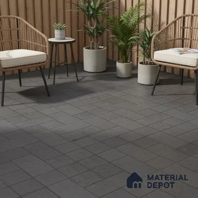 Scandinavian outdoor seating with grey stone floor tiles and vertical wood cladding