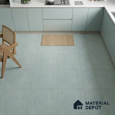 Modern kitchen with pastel blue laminate cabinets and matte blue stone-look floor tiles