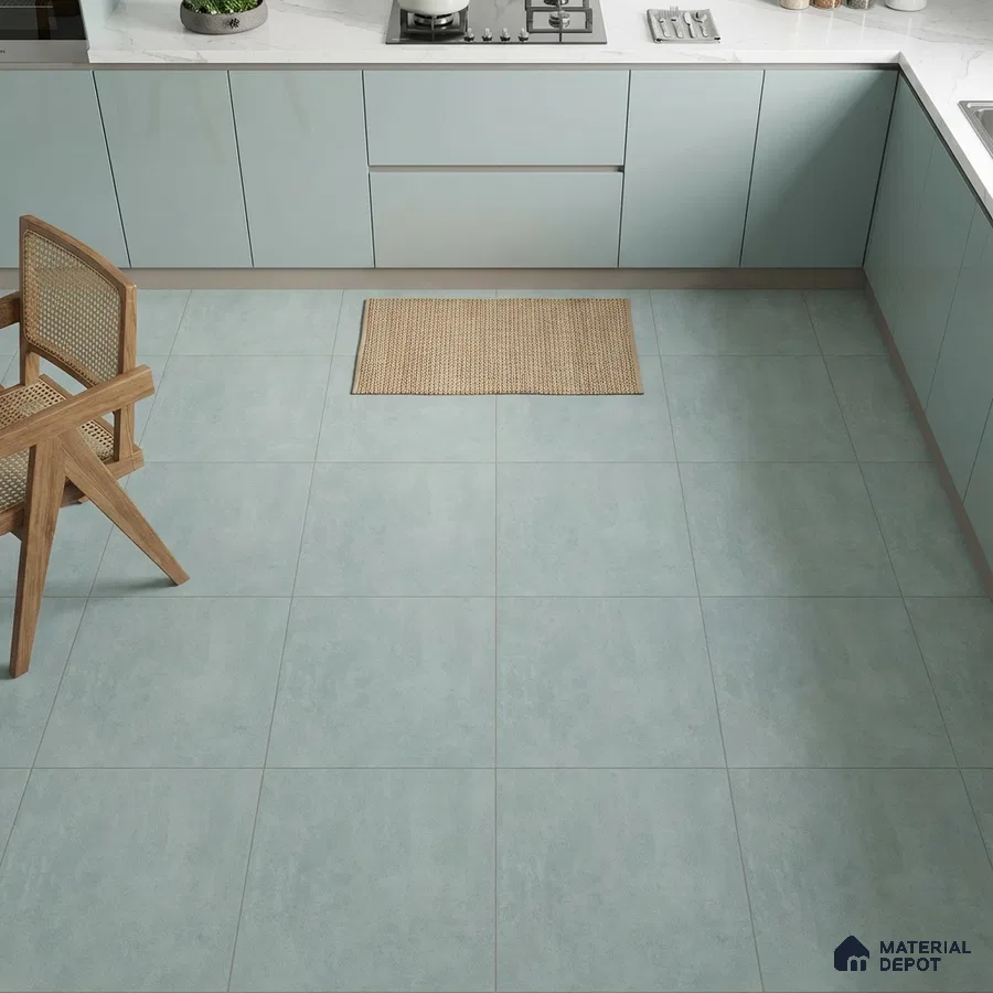 Modern kitchen with pastel blue laminate cabinets and matte blue stone-look floor tiles