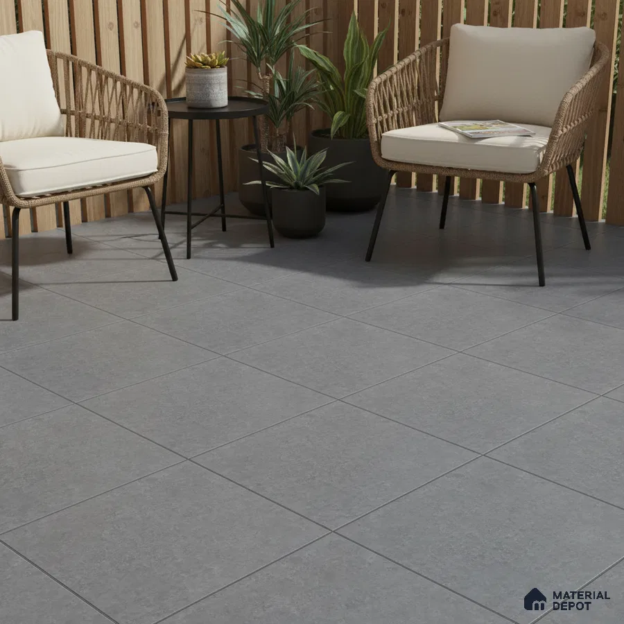 Scandinavian outdoor seating with grey stone-look floor tiles and natural wood louver panels