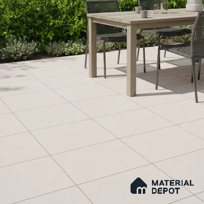 Minimalist outdoor patio with matte white floor tiles and natural wood dining set